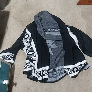 Over throw sweater/coverlet